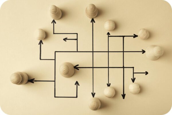 Top view of wooden pawns arrangement.